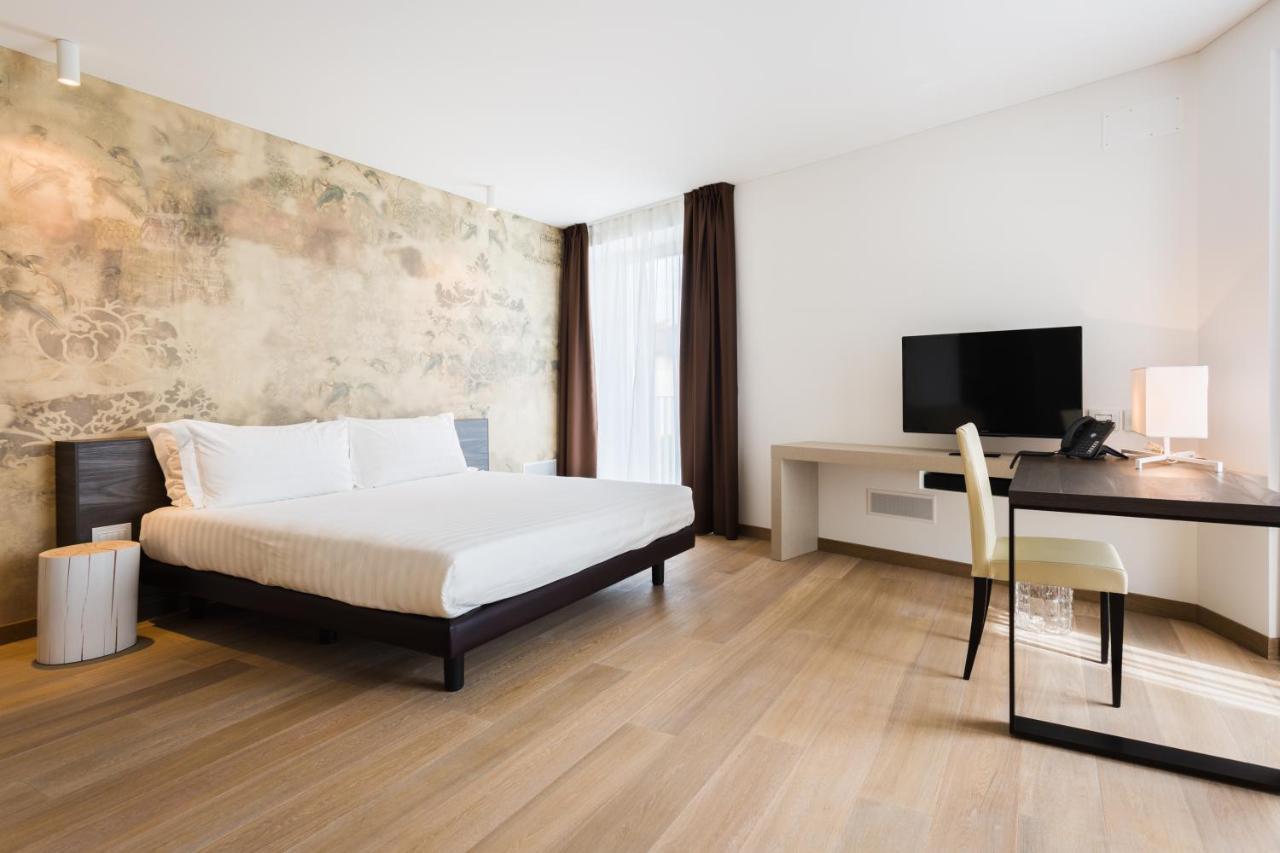 Suites Hotel Astor เบลลูโน ภายนอก รูปภาพ