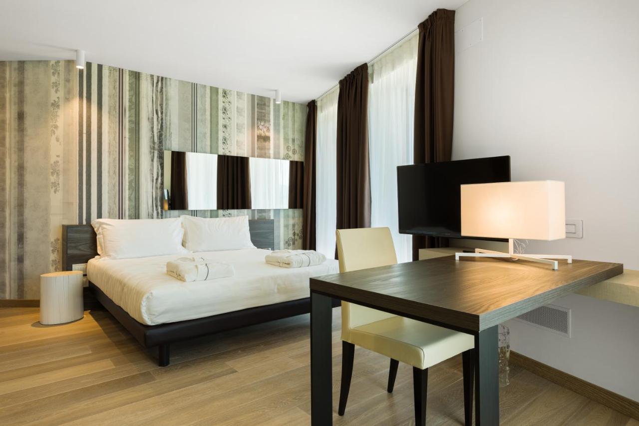 Suites Hotel Astor เบลลูโน ภายนอก รูปภาพ